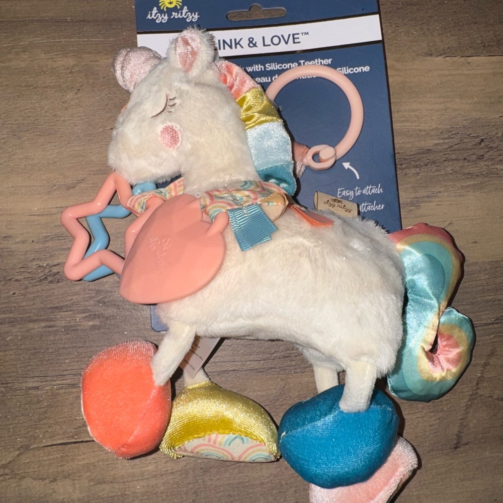 Itzy Ritzy Unicorn Stuffed Animal with Teether - White, Pink, Blue